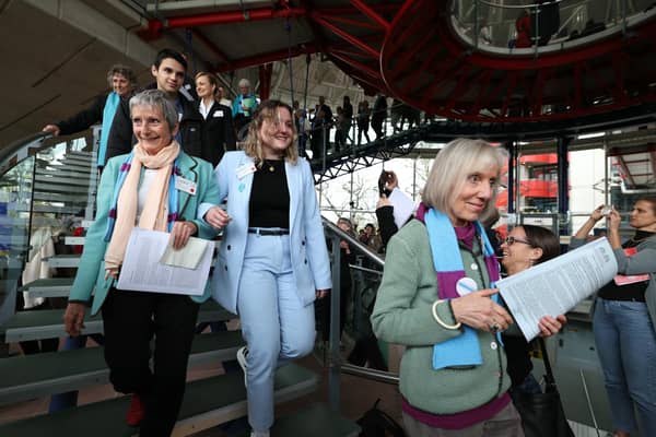 Members of Swiss association Senior Women for Climate Protection react after the announcement of decisions after a hearing of the European Court of Human Rights (ECHR) to decide in three separate cases if states are doing enough in the face of global warming in rulings that could force them to do more