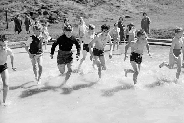 Boys in the paddling pool at St Margaret's Loch in Holyrood Park in July 1959.