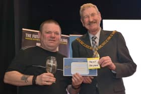 Craig Ogilvie (left) receiving his prize at the Paul Roggeman event in Yorkshire