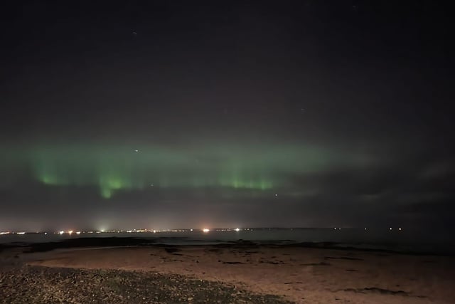 The Aurora Borealis could be spotted from the beach in Port Seton, East Lothian, on Sunday night.