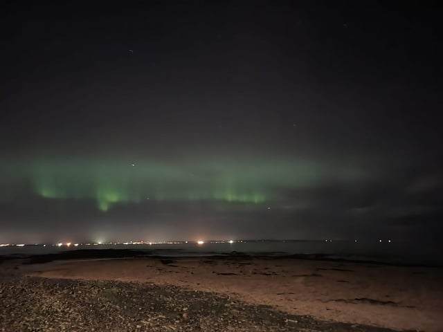 The Aurora Borealis could be spotted from the beach in Port Seton, East Lothian, on Sunday night.