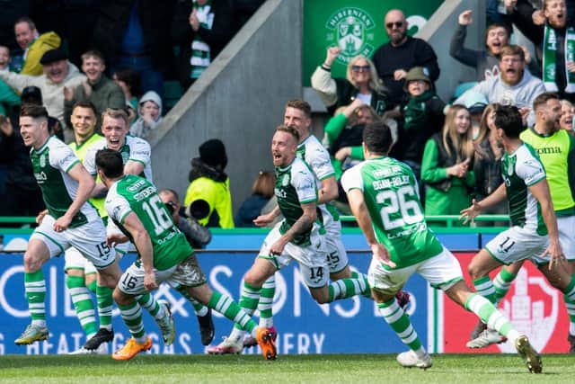 The Hibs team celebrate after Kevin Nisbet (far left) fired them in front in the Edinburgh derby. Picture: SNS