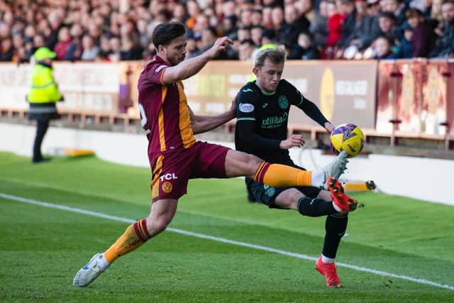 Henderson is challenged by Sondre Solholm Johansen during the 3-2 victory over Motherwell last month