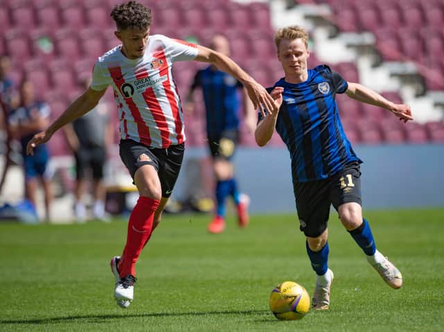 EDINBURGH, SCOTLAND - JULY 17: Hearts' Gary Mackay-Steven in action against Sunderland's Tom Flanagan during the Friendly  Match between Hearts and Sunderland at Tynecastle Park on July 17, 2021, in Edinburgh, Scotland. (Photo by Paul Devlin / SNS Group)