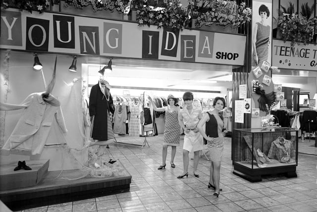 Three women model clothes in front of the Young Idea shop at the Leith Provident in Great Junction Street (May 1966).