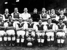 The Hibs team of 1947/48 - although Leslie Johnston is not pictured. Gordon Smith (front row, second left) Eddie Turnbull (front row, third right), Willie Ormond (front row, second right) and Lawrie Reilly (back row, extreme left) are all present