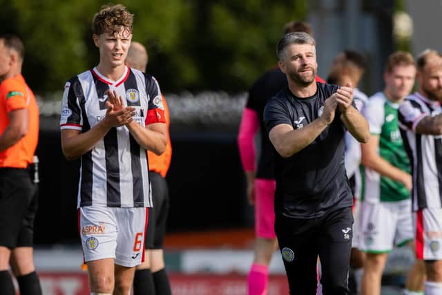 St Mirren boss Stephen Robinson with captain Mark O'Hara at full-time. Picture: SNS