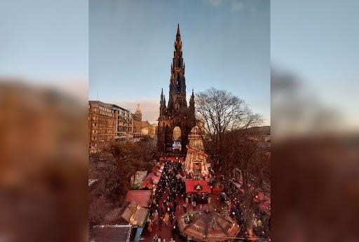 Stunning view of the market and the Scott Monument just as the sun is setting.