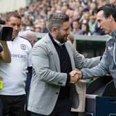 Hibs manager Lee Johnson greets Aston Villa counterpart Unai Emery ahead of the match at Easter Road. Picture: Ross Parker / SNS Group
