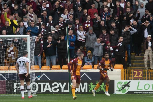 A disgruntled Hearts support watches on after Jonathan Obika opened the scoring for Motherwell. Picture: SNS