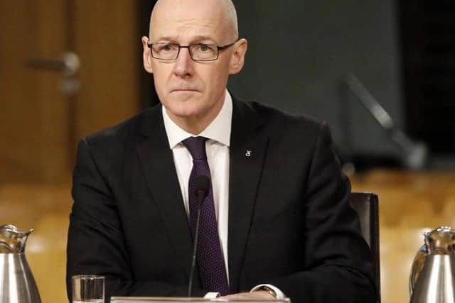 John Swinney, the education secretary, survived a vote of no confidence on the issue.