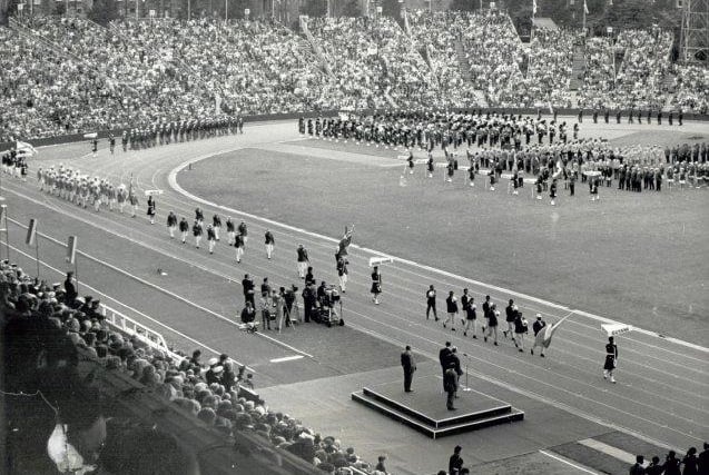 Athletes arrive in Meadowbank during the opening ceremony for the 1970 Edinburgh Games.