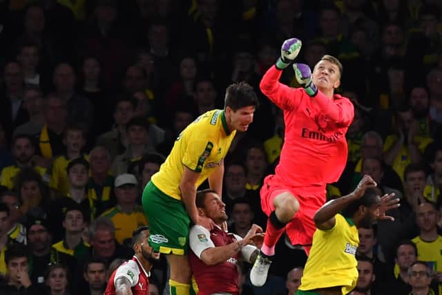 Macey in action for Arsenal during a Carabao Cup clash with Norwich