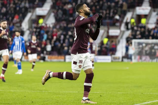 Josh Ginnelly, who started as Hearts' No.9, celebrates after opening the scoring against Kilmarnock. Picture: SNS