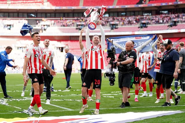 Sunderland's Aiden McGeady celebrates with the trophy after the Sky Bet League One play-off final at Wembley on Sunday. Picture: Tim Goode/PA