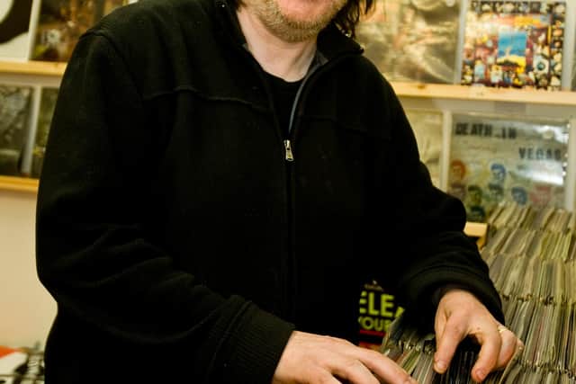Photographer-Ian Georgeson-
Owner of Avalanche records Kevin Buckle at his shop in the Grassmarket