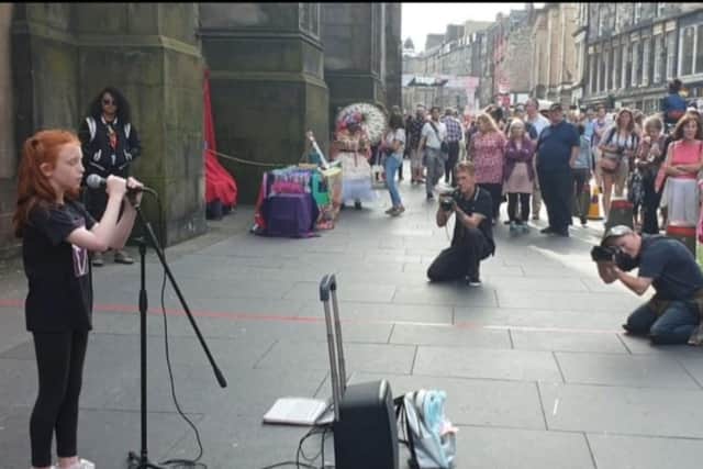 Elyssa first began busking in Edinburgh aged nine and her father, Dougie, said over the years her voice has got 'stronger and stronger'