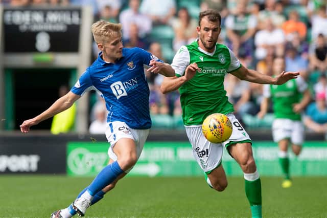 Hibernian’s Christian Doidge (R) competes with Ali McCann during the league meeting with St Johnstone in August last year. Pic: SNS Group Alan Harvey