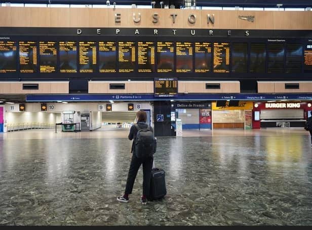 Passengers at Euston station in London, as members of the Rail, Maritime and Transport union begin their nationwide strike