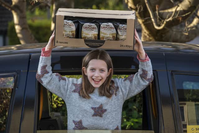 Ten-year-old Grace, from Edinburgh, won her battle to get haggis and black pepper crisps restored to the shelves after she wrote to James Taylor, managing director of Taylors Snacks, calling for the popular flavour to be available all year round.  Picture: Mike Wilkinson/Taylors Snacks/PA Wire