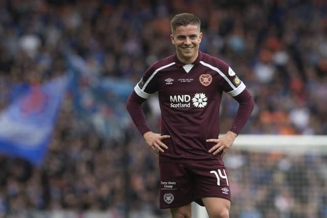 Hearts midfielder Cammy Devlin is unavailable for the next two league games due to suspension, but will be free to face Fiorentina next Thursday. Picture: SNS
