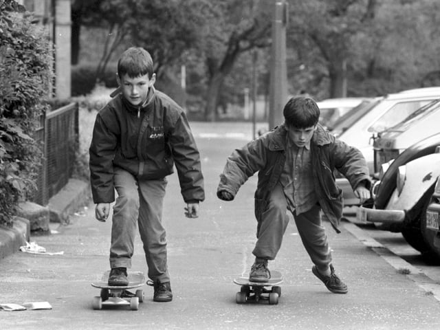 Picture shows Two boys with skateboards on Warrender Park Road in June 1989.
