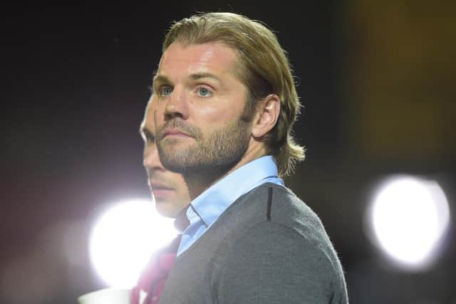 Robbie Neilson has returned to Hearts as manager.