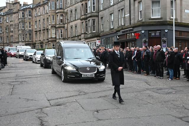 Regulars of the Polwarth Tavern in Edinburgh turn out to pay their last respects to popular landlord and Hearts fan, Alan Laidlaw, who died recently.
