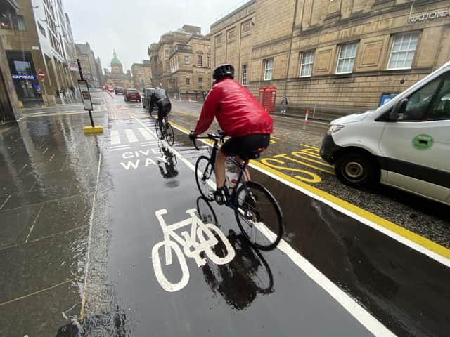 Floating bus stops are one feature of Edinburgh's Spaces for People project which separates the pavement from bus access by a cycle lane. Some elements of the programme, which was introduced during the pandemic, look set to be retained. PIC: Lisa Ferguson