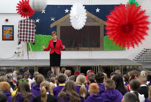 On becoming First Minister, Nicola Sturgeon asked to be judged on her track record on education (Picture: Andrew Milligan/PA)