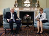 Boris Johnson and Nicola Sturgeon during the Prime Minister's visit to Bute House last year (Picture: Duncan McGlynn/pool photo via AP, File )