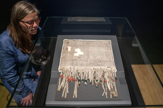 Senior Curator of Medieval Archaeology Alice Blackwell, takes a closer look at The Declaration of Arbroath on public display for the first time in 18 years at the National Museum of Scotland in Edinburgh, to mark its 703rd anniversary