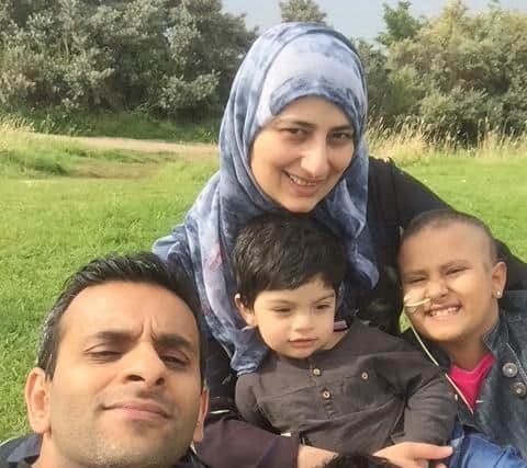 Raheen Iqbal with father Zahir Iqbal, 46,  mother Aisha Zahir, 37 and younger brothers, Yahya seven and Hasaan, four.