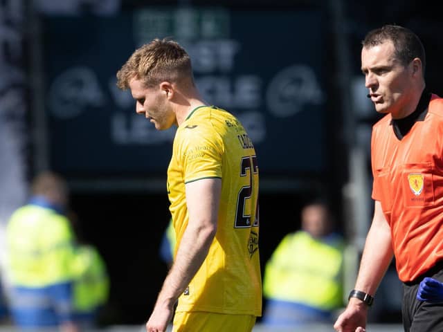 Chris Cadden makes his way off the pitch after picking up an injury
