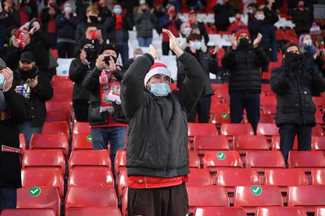 A socially distanced Liverpool fan. (Photo by Stu Forster/Getty Images)