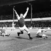 Joe Harper wheels away after beating Ray Clemence with what turned out to be the winner against Liverpool in September 1975