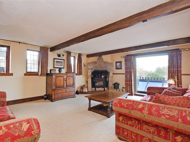 The principal reception room is the lounge, which features a log burner within a stone surround.