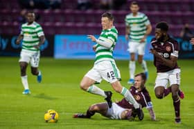 Andy Halliday brings down Callum McGregor during Hearts' 2-1 win over Celtic on Saturday. Picture: SNS