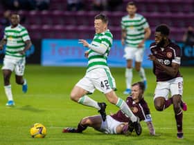 Andy Halliday brings down Callum McGregor during Hearts' 2-1 win over Celtic on Saturday. Picture: SNS