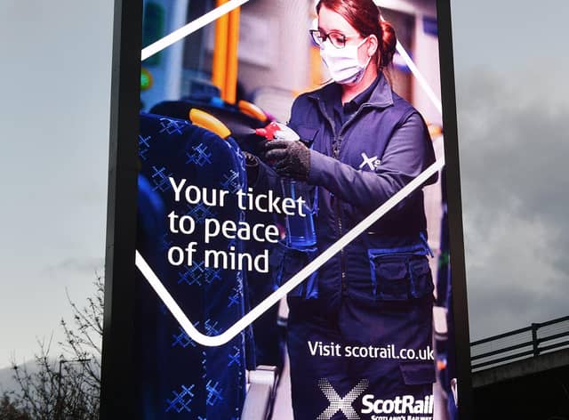 Face coverings have been compulsory on Scottish public transport since June last year. Picture: John Devlin
