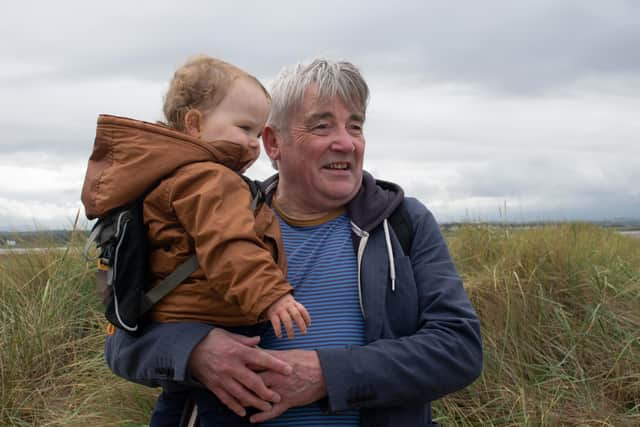 Dougie enjoying a country walk with his grandson Brodie.