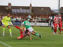 Hibs winger Aiden McGeady tracks back to clear the danger from Bonnyrigg's Scott Gray. Picture: Joe Gilhooley LRPS