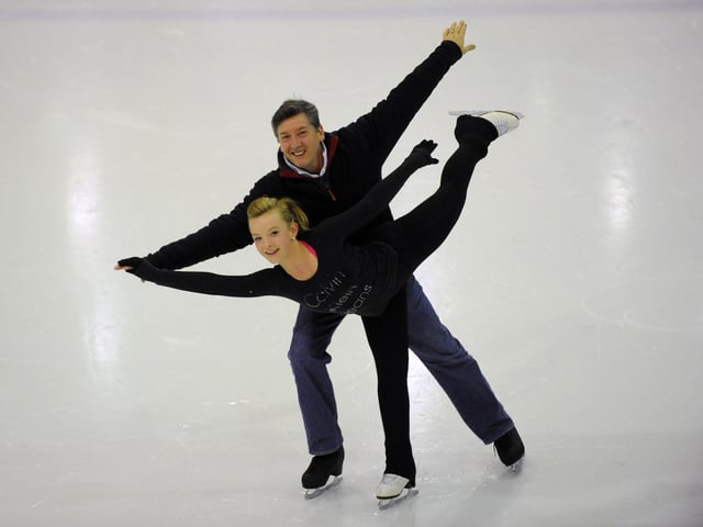 Robin Cousins, former Olympic Ice skating star, coaches young Scottish ice skater Lana Bagen (14) at Murrayfield Ice Rink in 2011.
