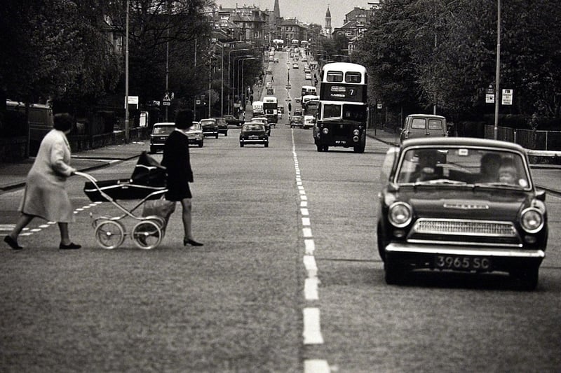 Two women crossing Minto Street in Edinburgh with a pram in the 1960s.