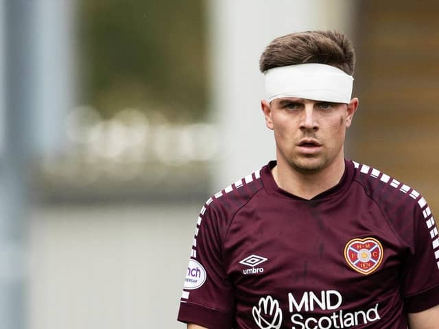 Hearts midfielder Cammy Devlin suffered a head injury at St Mirren last month. Pic: SNS