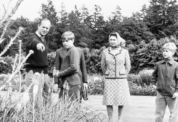 Queen Elizabeth II and the Duke of Edinburgh with sons Prince Andrew, left, and Prince Edward, at Balmoral to celebrate their Silver Wedding anniversary.