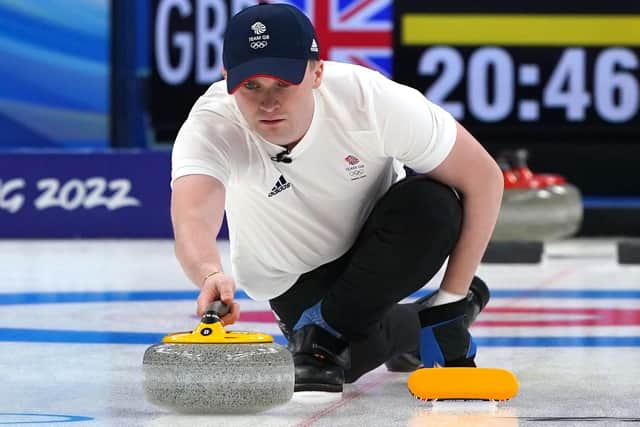 Great Britain's Bruce Mouat, and his lucky hat, in action during the mixed doubles round robin victory over the Czech Republic.