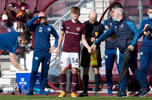Finlay Pollock was handed his Hearts bow by Robbie Neilson after impressing. Picture: SNS