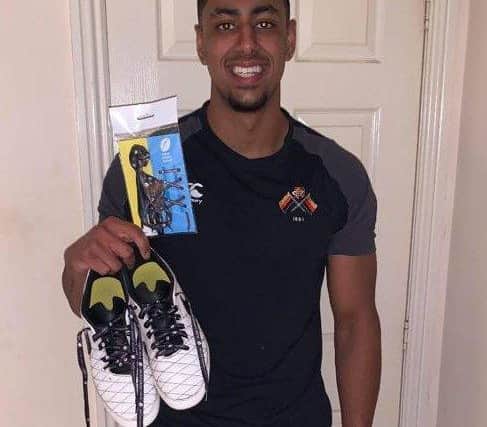Aaron showcasing the laces as a brand ambassador