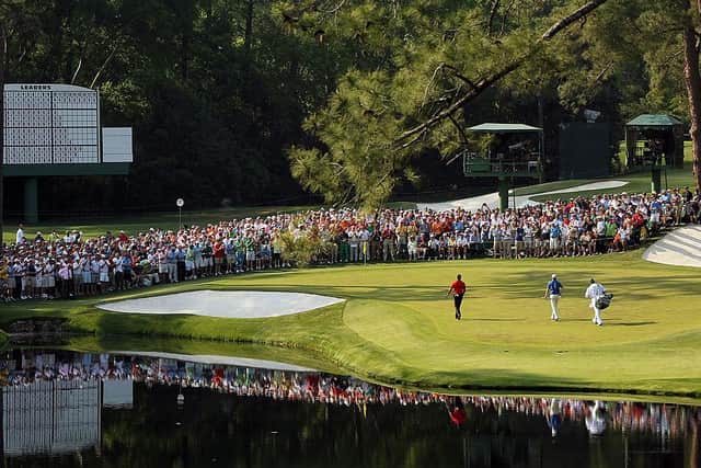 Tiger Woods and Martin Laird walk on to the 16th green during the final round of the 2011 Masters Tournament at Augusta National Golf Club. Picture: Jamie Squire/Getty Images.